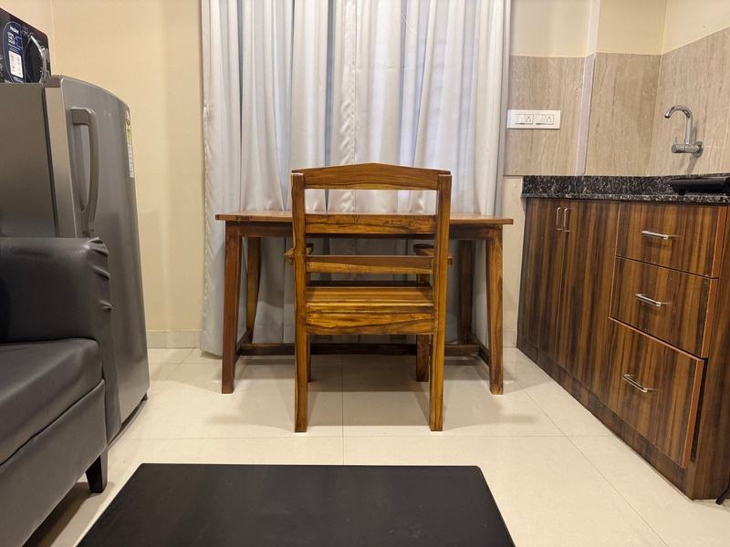The teak desk and chair in an apartment