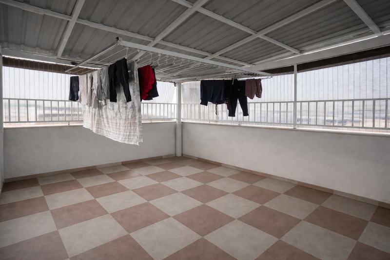 Retractable drying racks in the sixth-floor drying area