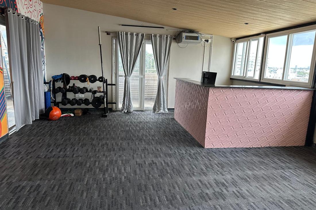 The gym: free weights, dumbbell rack, barbell and medicine ball